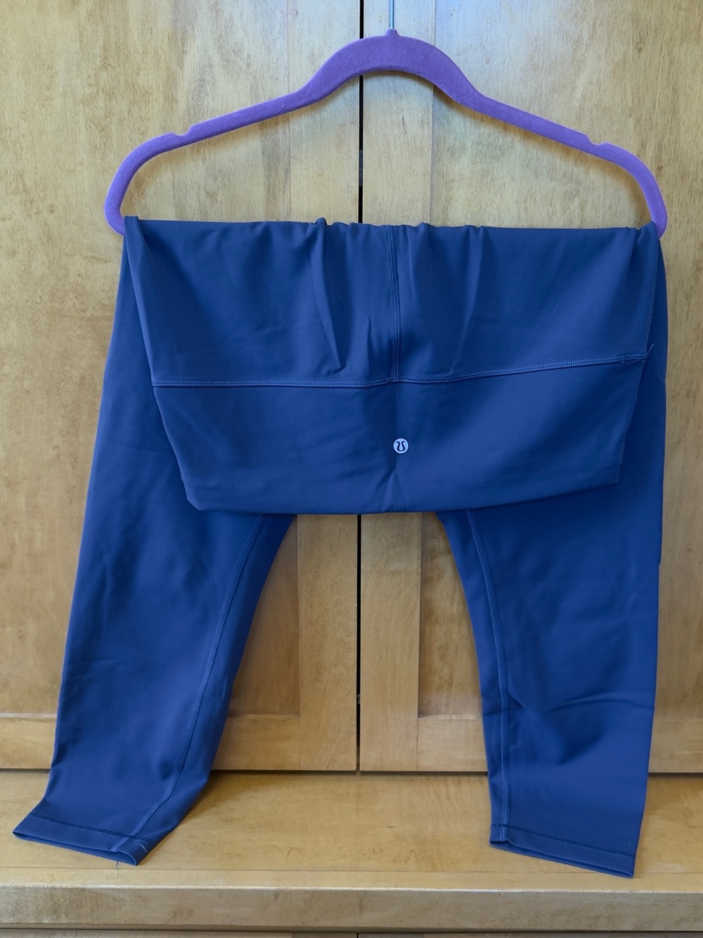 lululemon athletica dark blue cropped leggings with silver logo dot